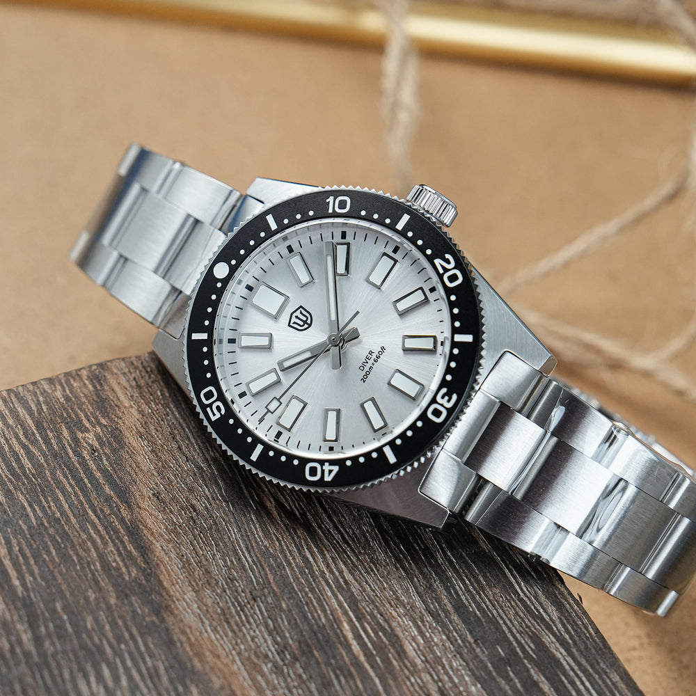Watchdives WD1965 with a silver-white sunray dial, rectangular hour markers, black bezel and steel bracelet